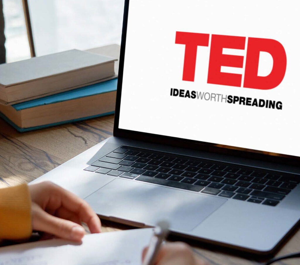 A laptop computer with a TED talk intro slide