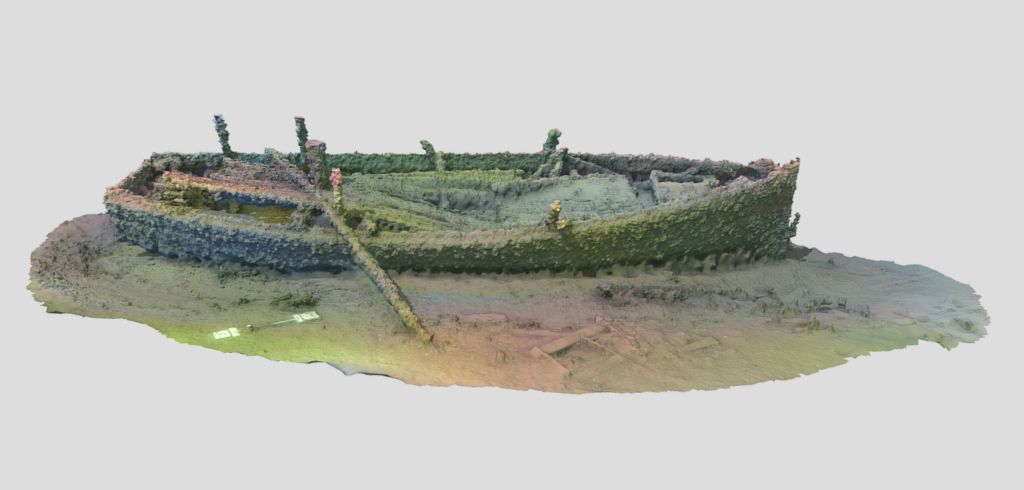 Photogrammetry model of the shipwreck, Little Harbor launch. A photogrammetry model uses specialized software to "stich together" many overlapping 2D photographs to create a 3D representation of a real-world object.